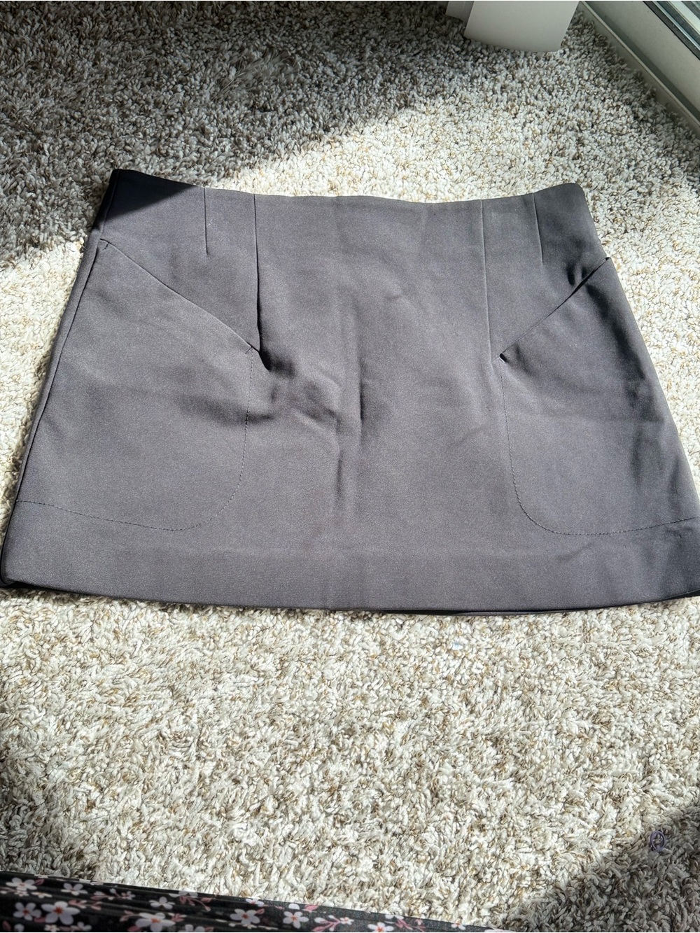 H&M Black Mini Skirt with Front Pocket Details